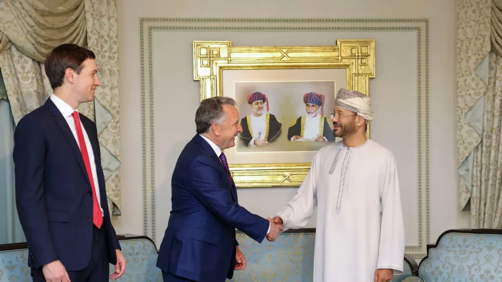 Perundingan Nuklir AS–Iran di Oman Berakhir 1 In this handout photo released by the Omani Ministry of Foreign Affairs on February 6, 2026, US special envoy Steve Witkoff shakes hands with Oman's Foreign Minister Badr bin Hamad al-Busaidi as Jared Kushner looks on during a meeting in Muscat.